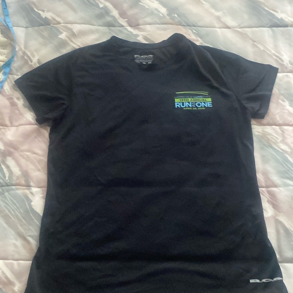 NYRR Run as One micro polyester women’s running shirt. Black